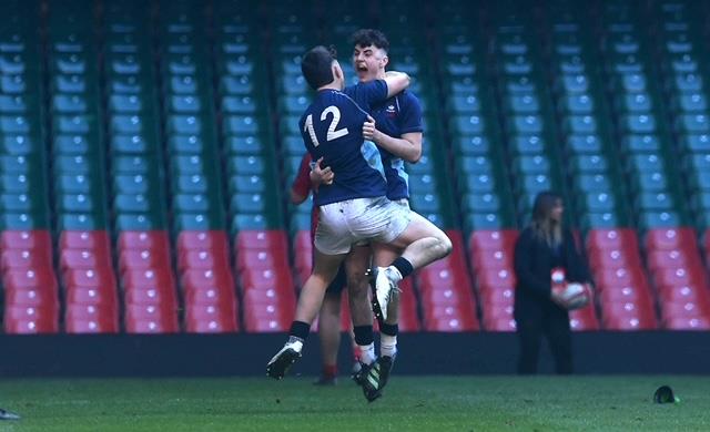 Twins jumping for joy